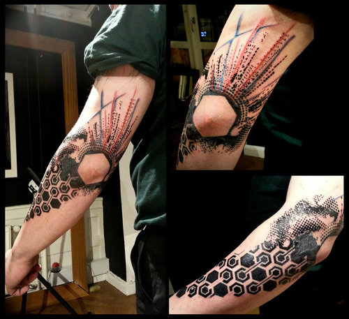 Abstract Black Ink Tattoo On Elbow