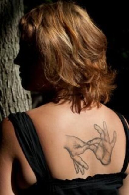 Nice 3D Hands Tattoo On Girl Upperback